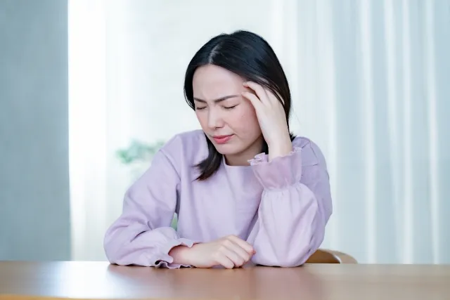 体調不良　女性