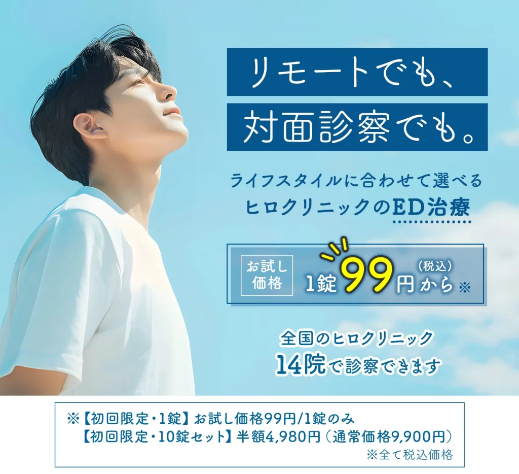 屋外で空を見上げる青年